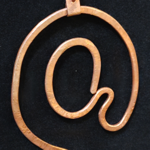 the influencer hammered copper wire pendant